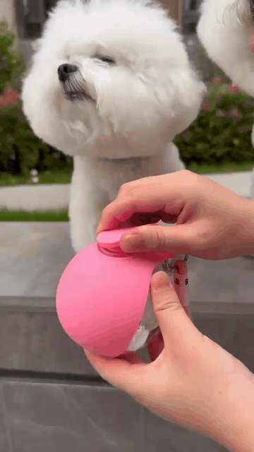 Paw Sip's water-release button being used