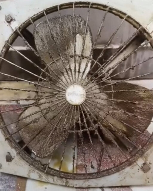Customer photo of a greasy exhaust fan before cleaning