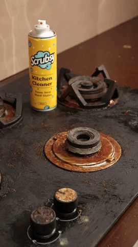Messy kitchen stove before cleaning